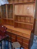 A teak sideboard.