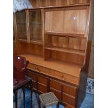 A teak sideboard.