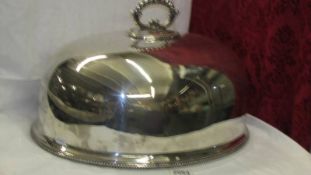 A large silver plate meat cover, 40 x 35 cm.