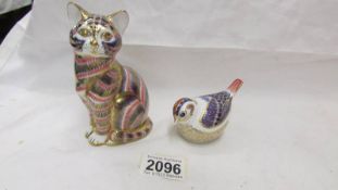 Two Royal Crown Derby paperweights with gold stoppers - Cat and bird.