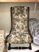 A Victorian nursing chair (recovered & missing brass to embellishment 1 side)