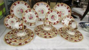 In excess of 30 pieces of Royal Albert 'Lady Hamilton' pattern table ware comprising:- 6 dinner