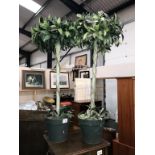 2 artificial topiary trees in pots