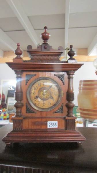 An 8 day striking mantel clock.