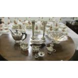 A mixed lot of silver plate including teapot, spill vases, etc.