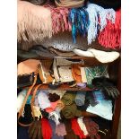 A mixed lot of scarves, gloves, bags etc.