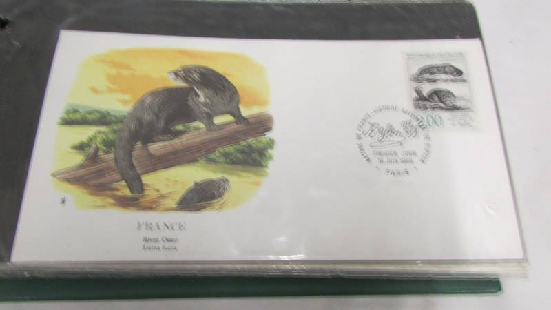 4 Albums of first day covers being 2 Russian, 1 Flora and Fauna and one other. - Image 18 of 21