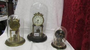 Three anniversary clocks for spares or repair, Large and medium have glass domes,