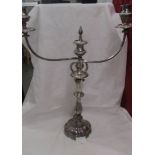 A large silver plate candelabra.