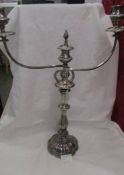 A large silver plate candelabra.