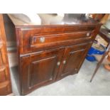 A mahogany cabinet.