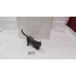 A boxed Richard Cooper & Company, art in bronze, limited edition crouching cat, 95/100.