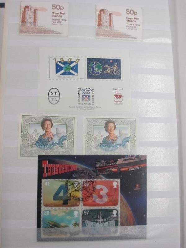 A good album of mint definitive stamps and sets (some in strips, many with gutter sides), - Image 11 of 13