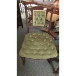 A pair of Victorian nursing chairs with buttoned backs and seats.