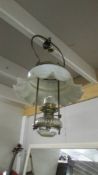 A hanging oil lamp.