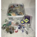 A large lot of assorted badges & key rings
