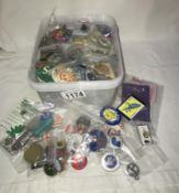 A large lot of assorted badges & key rings