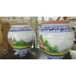 Two large hand painted pots.