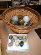 A collection of marble and stone eggs.