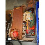 A box of assorted wooden items.