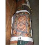 An old lounge carpet, 7'6" x 5'3".