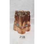 A Victorian copper jelly mould. ****Condition report**** All 5 crowns dented on tips.