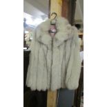 A short fur jacket.