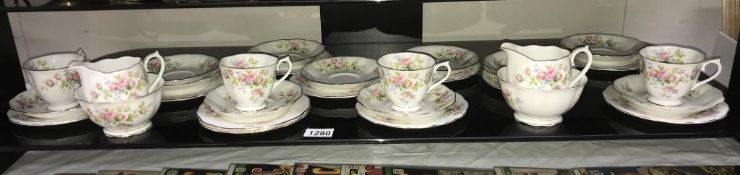 A quantity of Royal Albert Moss Rose tea ware (possibly 1950's)16 piece set & 6 extra plates,