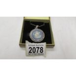 A silver Wedgwood blue Jasper pendant.