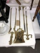 Art nouveau brass fire irons & 2 fender stands