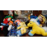 A quantity of knitted soft toys.