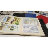 Four folders of assorted world stamps.