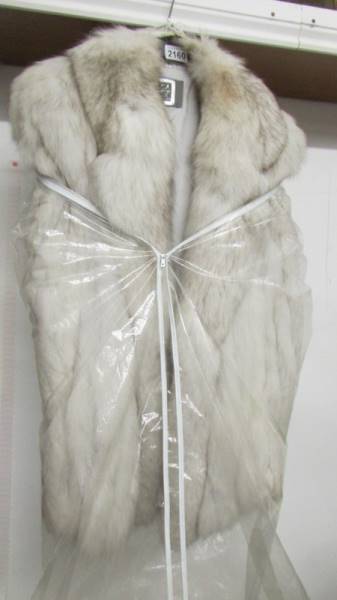 A Saga fox fur coat, size medium.
