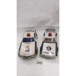 Two large tin plate battery operated American police cars - Trans-Am and Tornado.