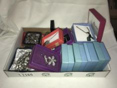 A mixed lot of boxed necklaces,