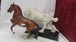 A Goebel horse and a Beswick horse.