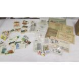 A mixed lot of cigarette cards (some in albums) including Senior Service, Player's, Will's,