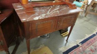 A marble topped hall table.