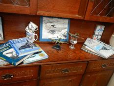 A quantity of aircraft memorabilia.