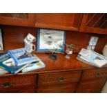 A quantity of aircraft memorabilia.