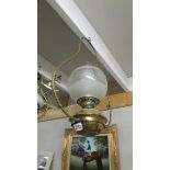 A hanging oil lamp.