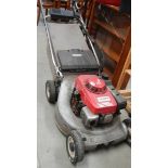 A Honda HR216 petrol mower.