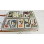 An album of late 19th/early 20th cigarette cards including Will's, Player's, Ogden's, Carreras etc.