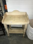 A pine wash stand.