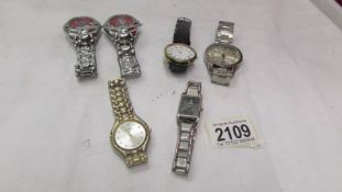 3 Gent's wrist watches and 3 ladies wrist watches.