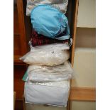 A quantity of bed covers.