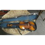 An old violin in hard case. ****Condition report**** No label inside violin.