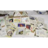 In excess of 200 assorted postcards, stamped envelopes etc.
