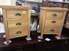 A pair of solid oak bedside chest of drawers (42cm x 32cm x 56cm high)