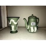 A Wedgwood jasperware coffee pot & vase ****Condition report**** Both pieces are in
